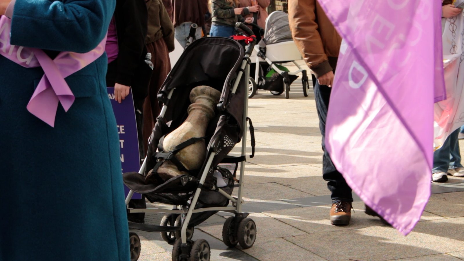 baluster in crowd with purple crowd